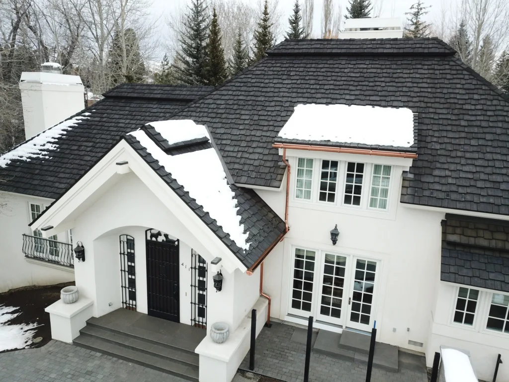 Home with snow on the roof. 
