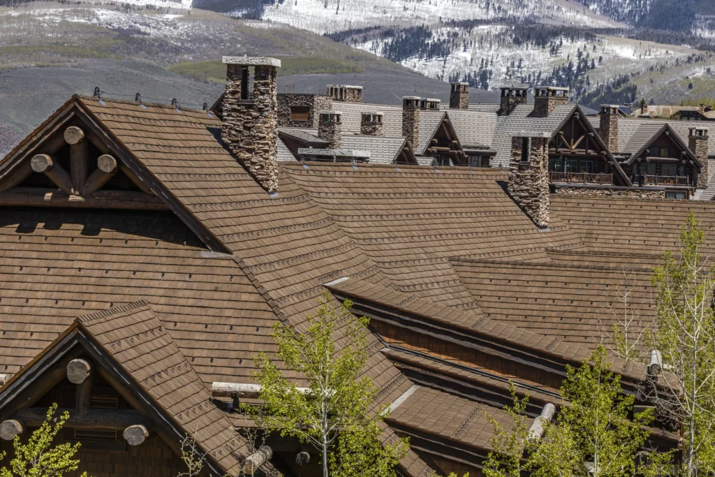 Crane installing CEDUR roofing at The Timbers with Horn Brothers Roofing.