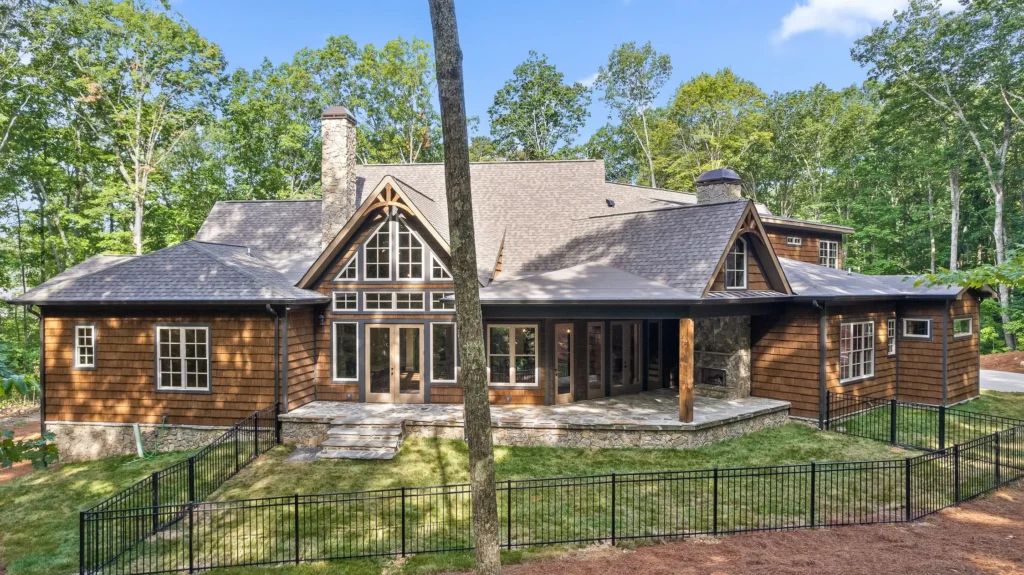 Home with synthetic shake roofing and wood-style siding.
