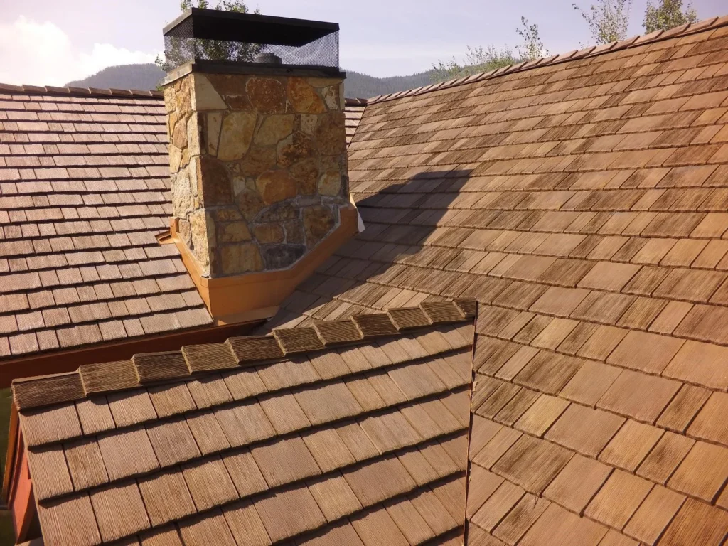 Fiber cement roofing alternative known as CEDUR synthetic roofing shakes.