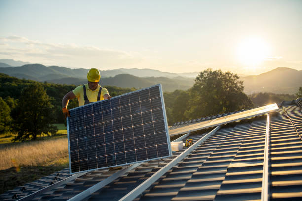 Installation of solar panels on a roof.