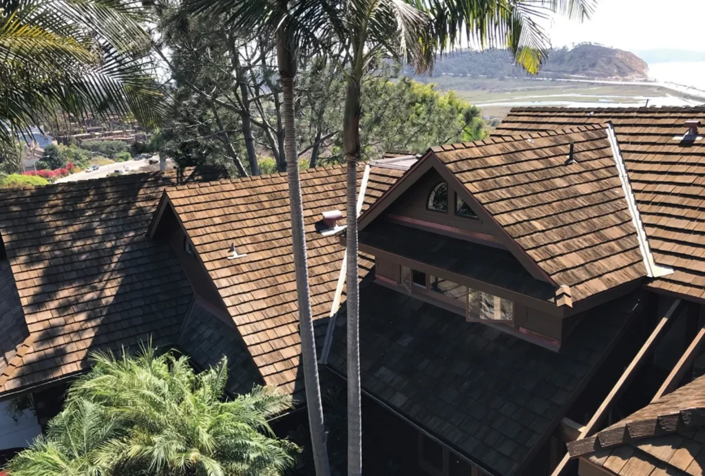 A CEDUR synthetic roof on a house in a  tropical setting. 