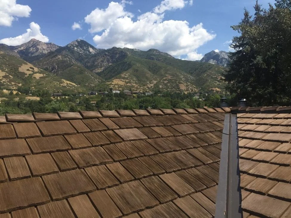Synthetic CEDUR shingles on a roof in the mountains. 