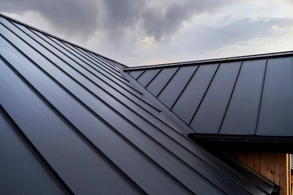 A close up look at a metal roof on a house. 