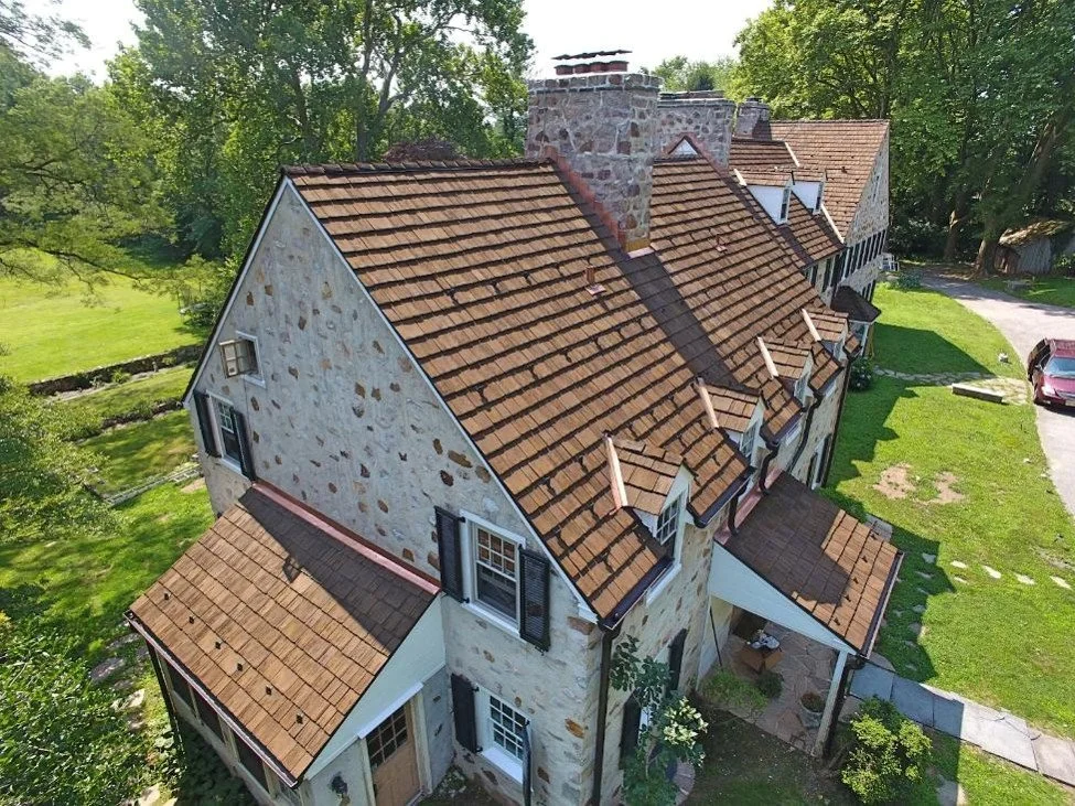Snow-guard equipped brown synthetic roof in Berwyn, PA