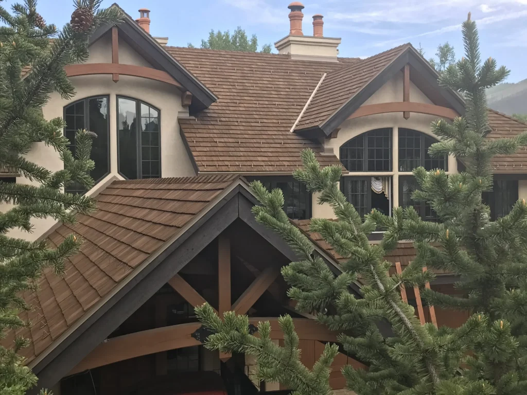 Residential home featuring a CEDUR synthetic shake roof.