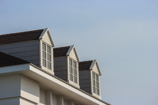 Fiber cement roof with three glass windows.