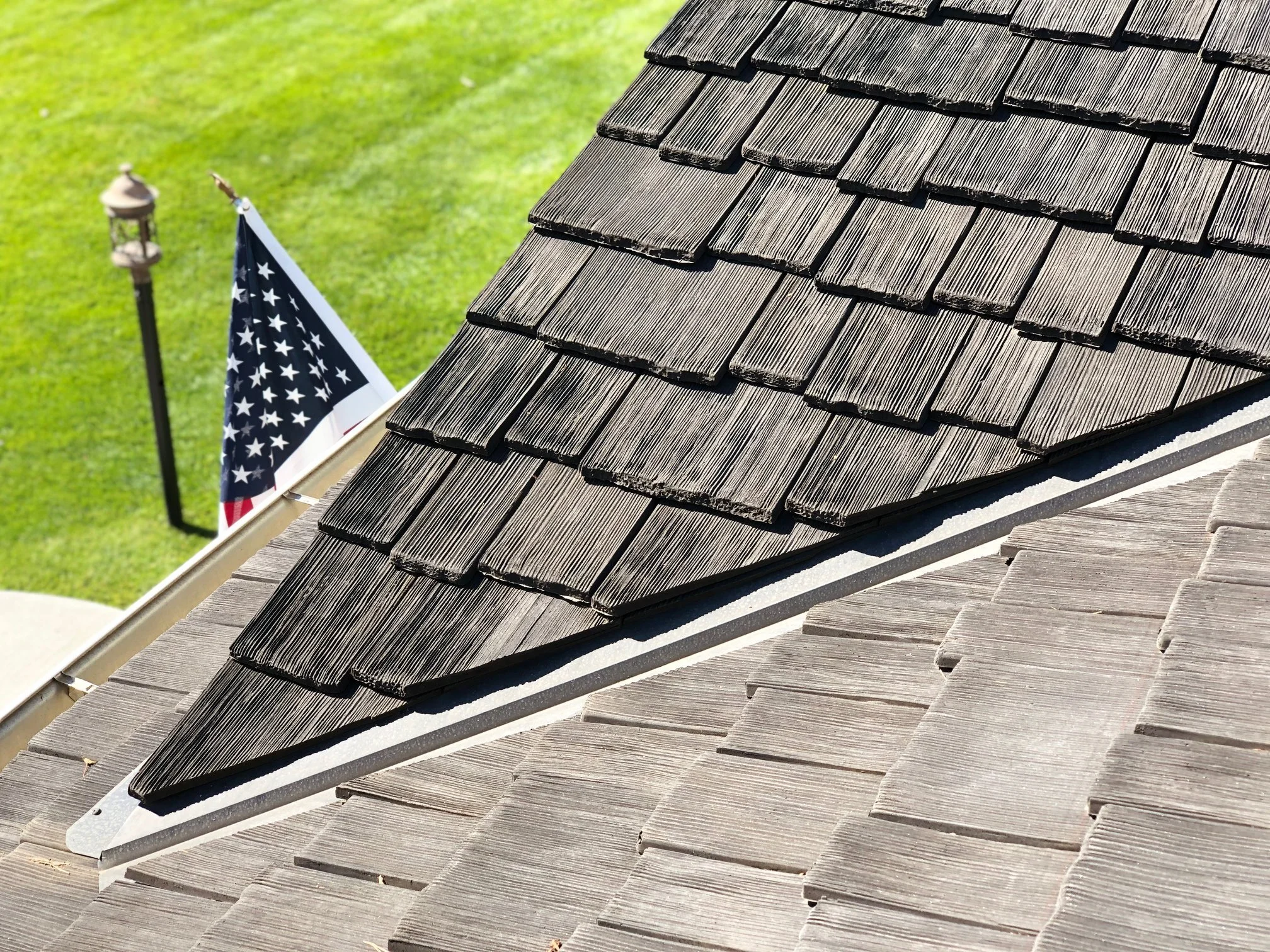 An alternative to fiberglass shingles, composite synthetic wood roofing tiles.