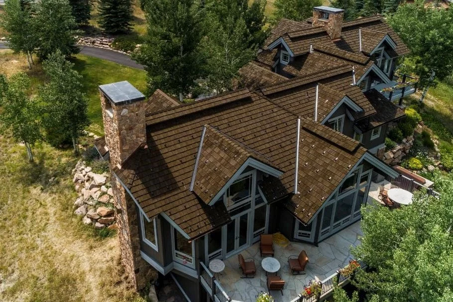 An image of a house with CEDUR synthetic shake shingles