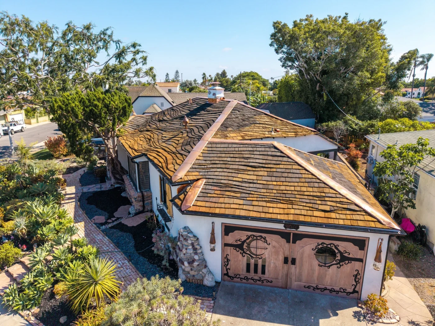 Storybook style home with wave course