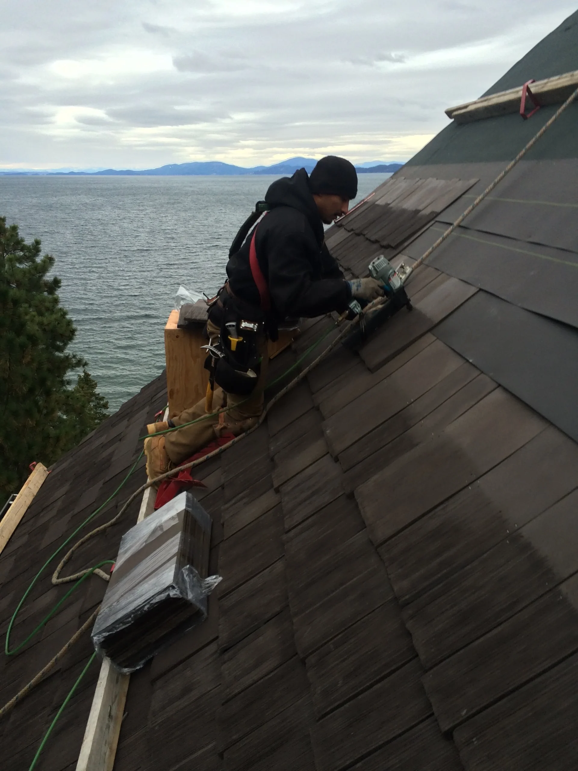 Cedar wood shake shingle composite roof installation in Montana