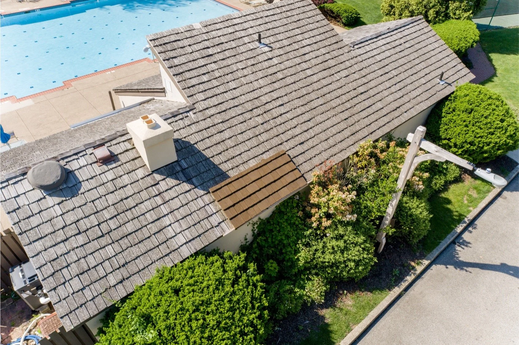 whitpain farm hoa with original wood roof and synthetic wood shake roof in Pennsylvania