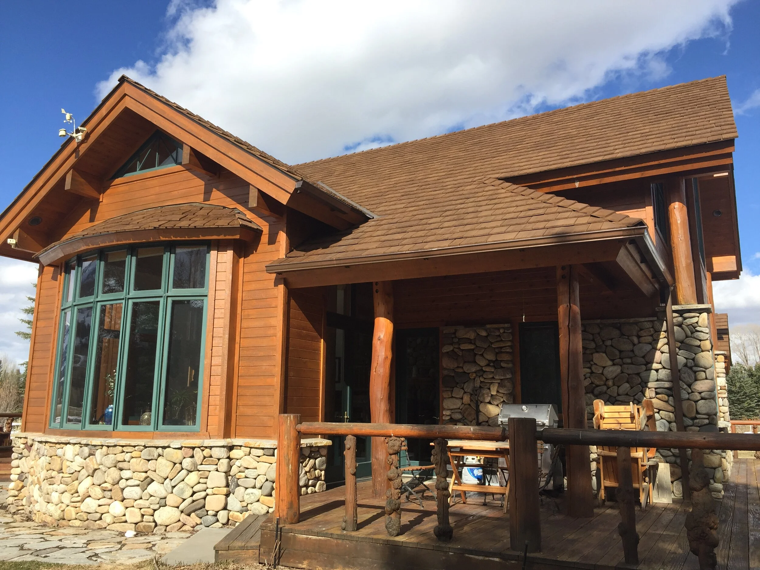 Rustic faux cedar shake roofing material.