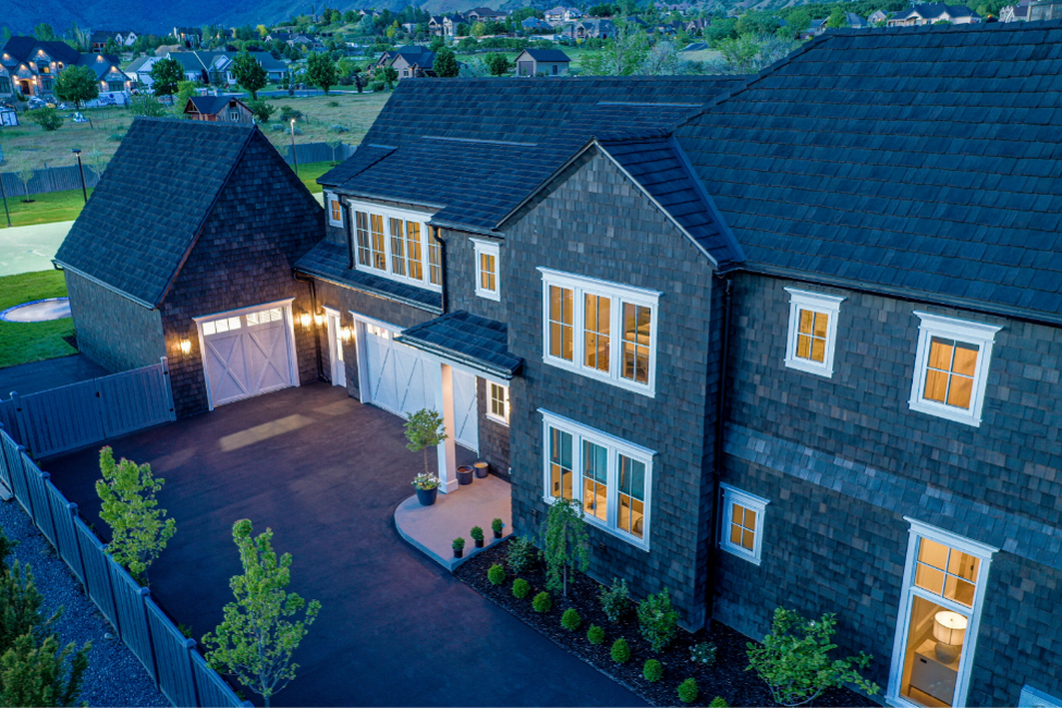 home with synthetic cedar shake roof