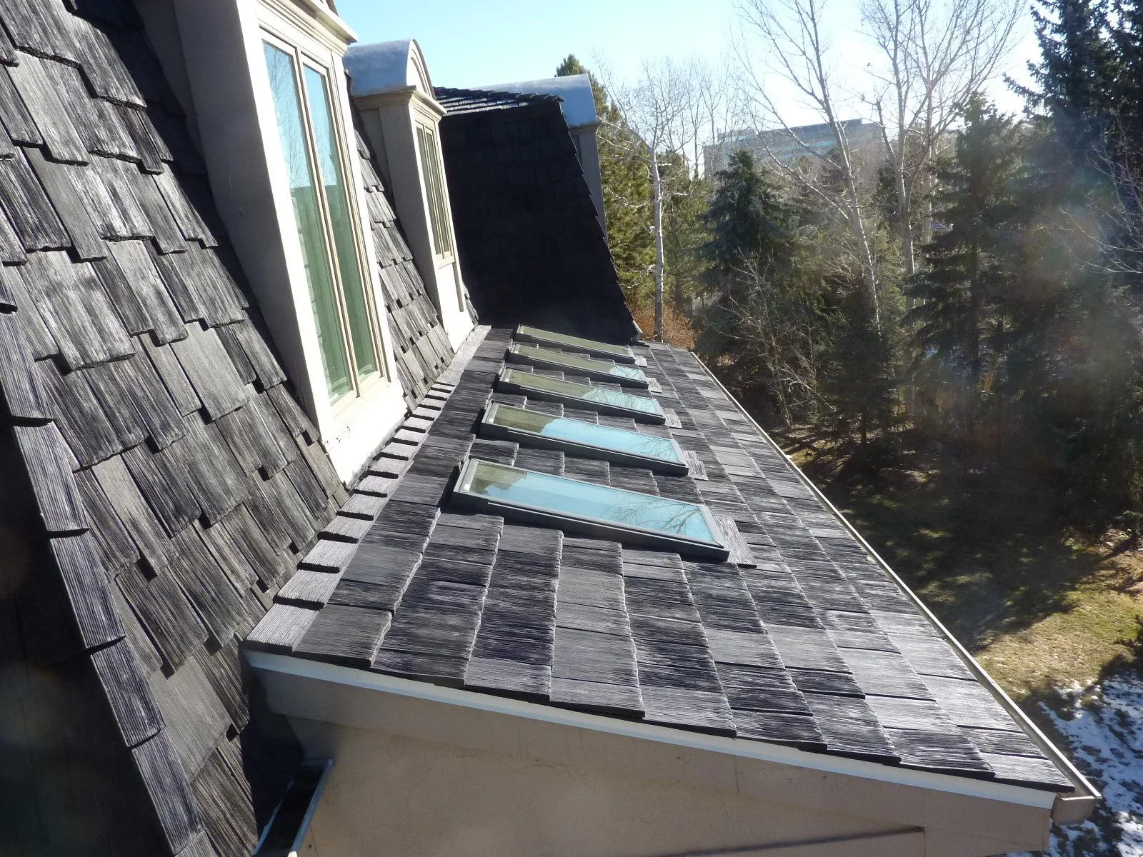 Mansard roof with architectural shingles