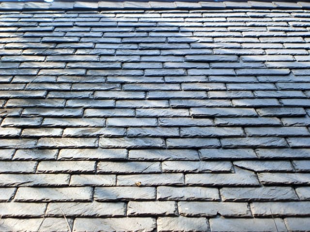 real-slate-roofing-material-on-home.JPG