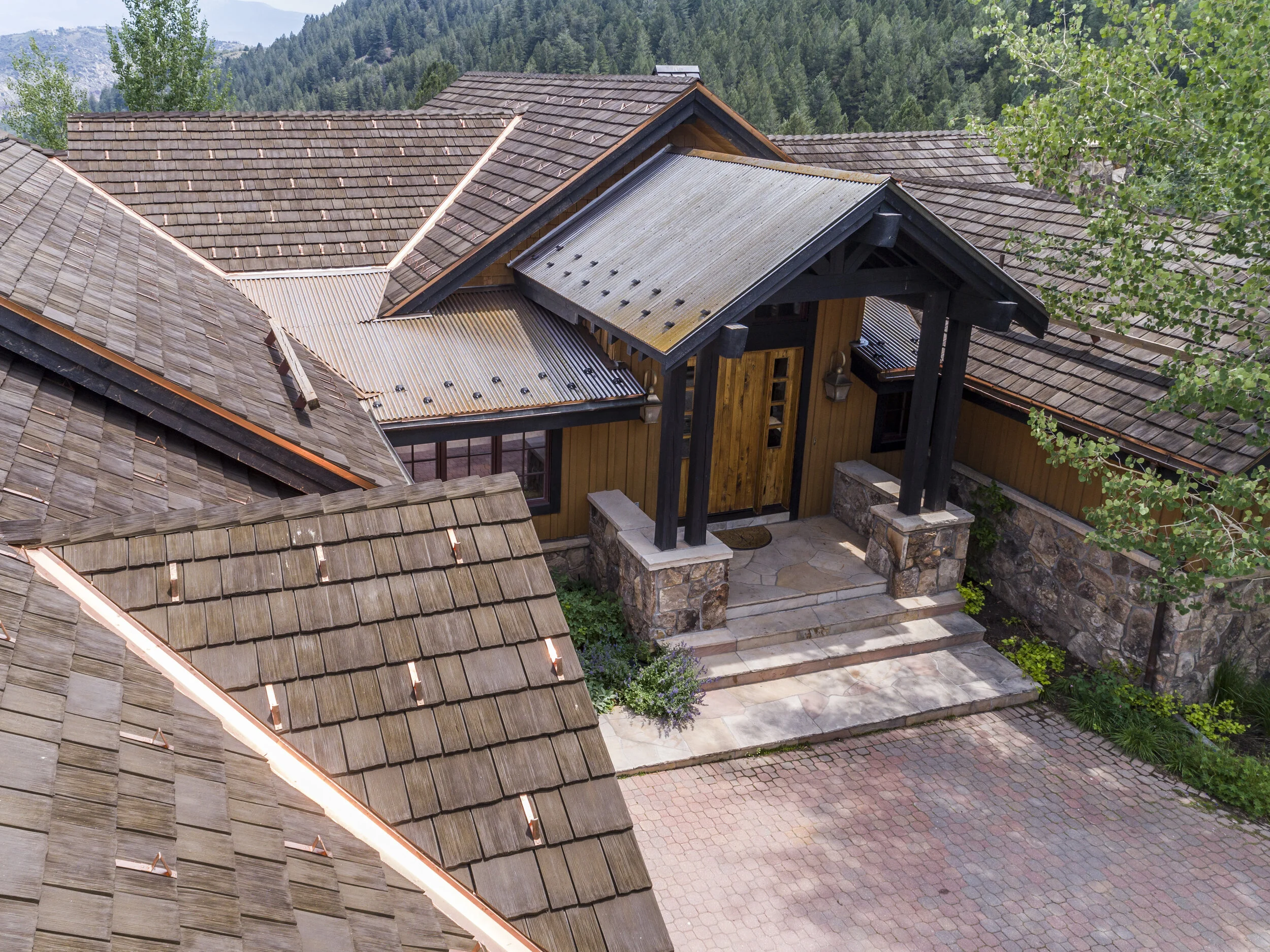 Synthetic wood shake shingles.