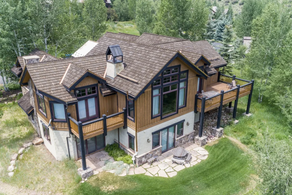 A large deck on a mountain home.