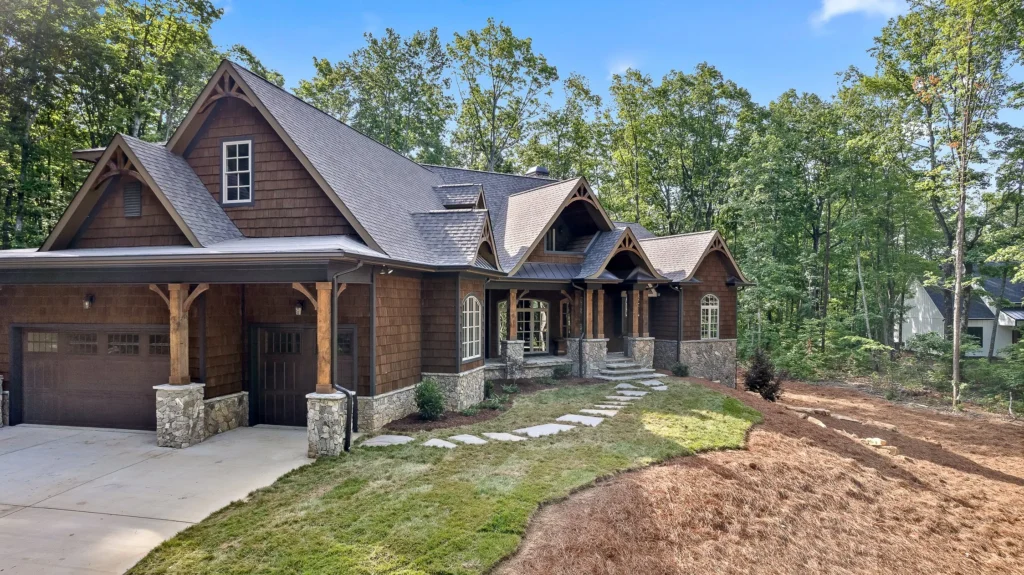 Dark brown shake siding for a rustic look.