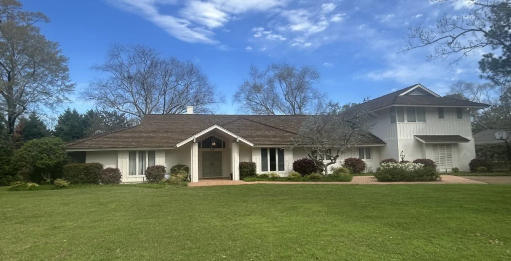 A house with a rood replaced by MRE Roofing,