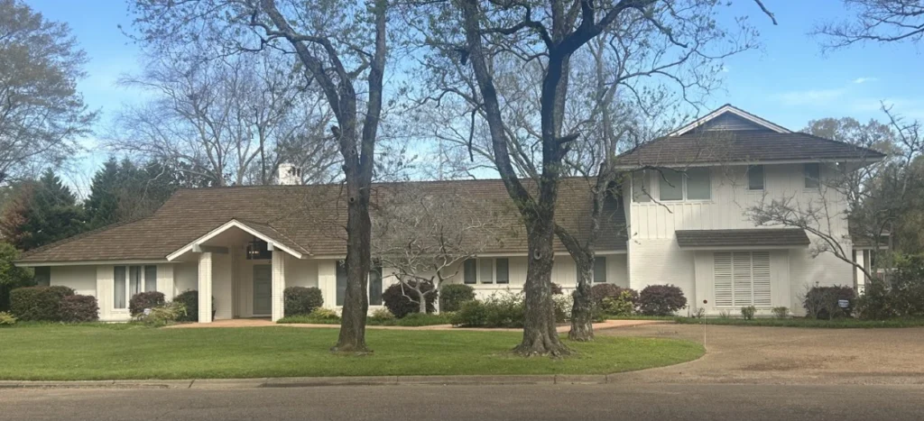 A house with a rood replaced by MRE Roofing,