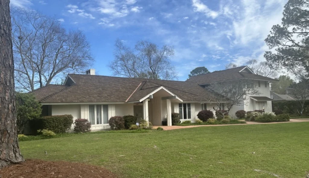 A house with a rood replaced by MRE Roofing,